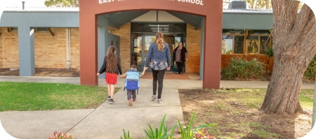 Family entering East Waikiki Primary School